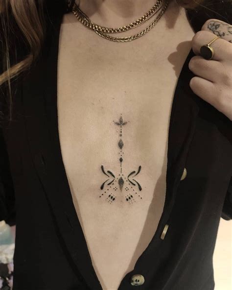 inbetween breast tattoos|46 Unique Tattoo Ideas Between the Breasts:。